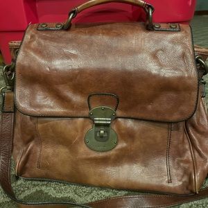 This bag would be a great bag for a teacher.  Has a long adjustable strap also.